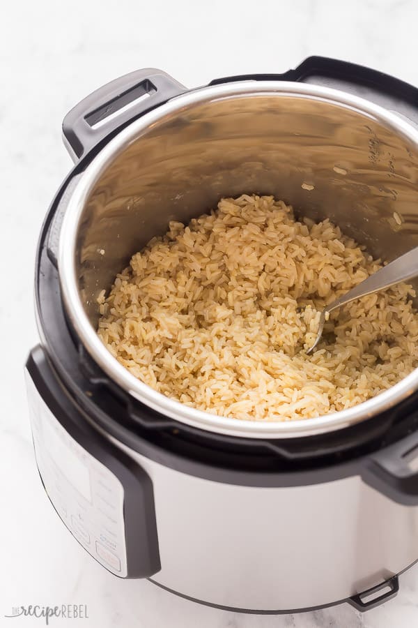 A tried and true recipe for PERFECT Instant Pot Brown Rice, every time. Use long grain brown rice or brown basmati. Includes a variety of flavor options! #instantpot #pressurecooker #rice #recipe #brownrice instant pot brown rice in pressure cooker